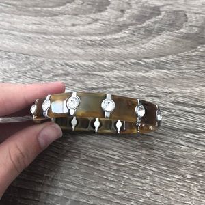 brown bracelet with gems